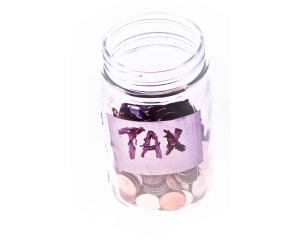 Tax jar filled with coins