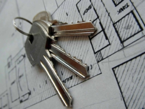 rent or buy home keys on a blueprint